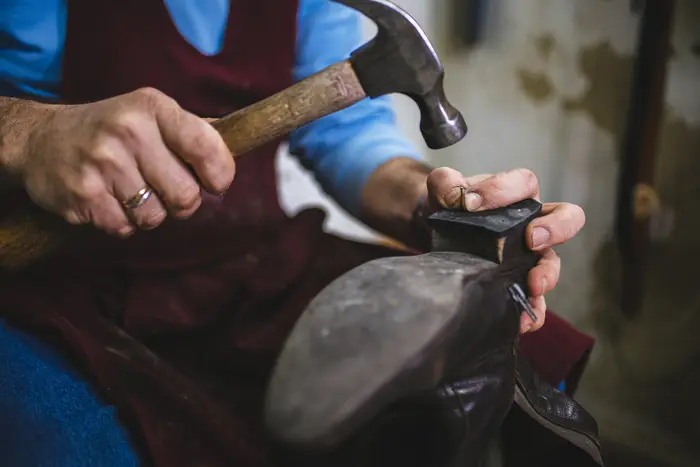 a cobbler with a hammer